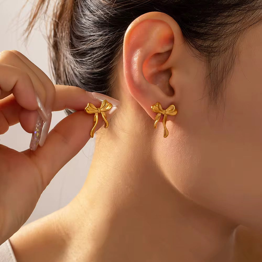 Aretes forma de laso 🛍️✨