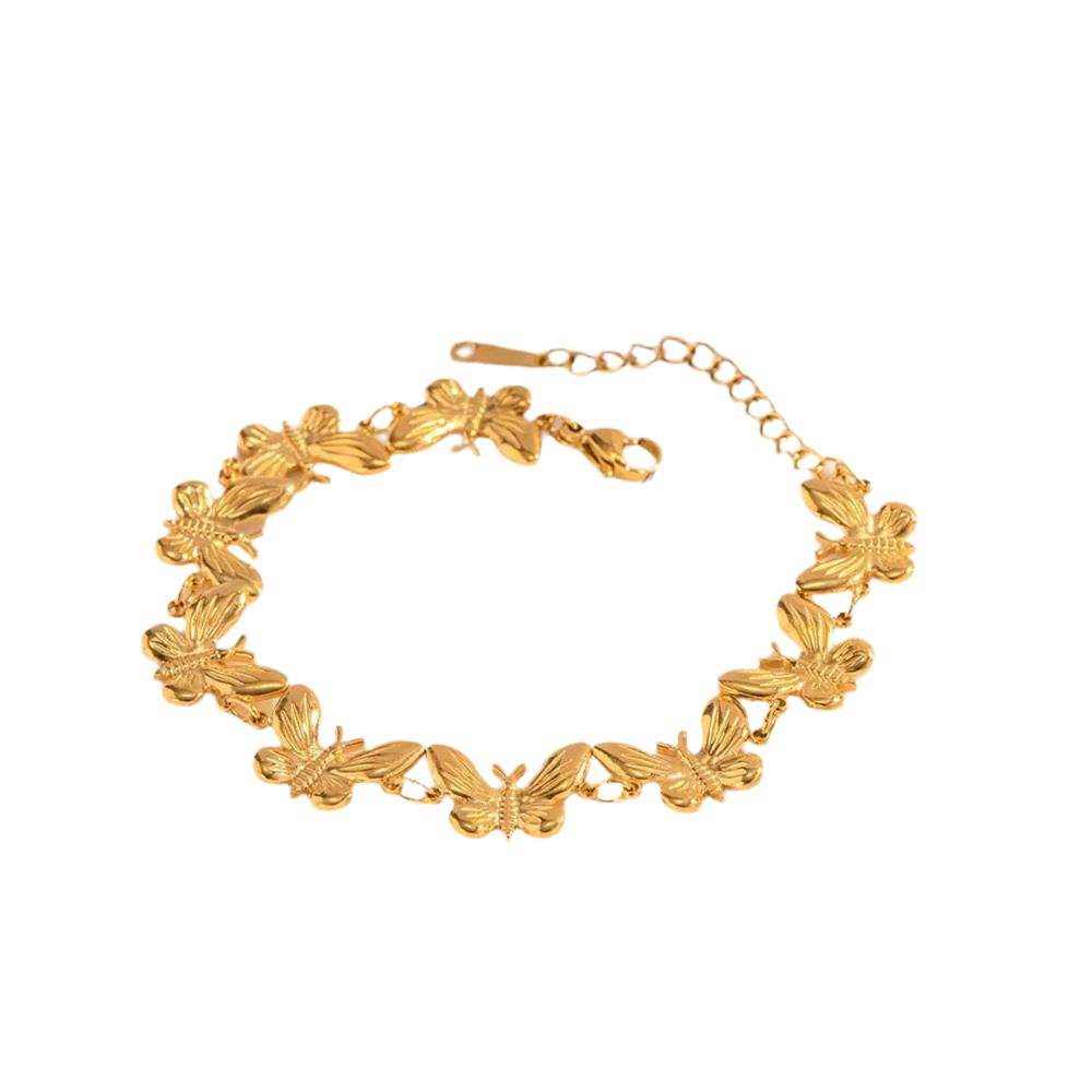 Gold bracelet with butterfly designs on a white background