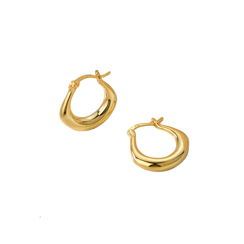 Gold hoop earrings on a white background